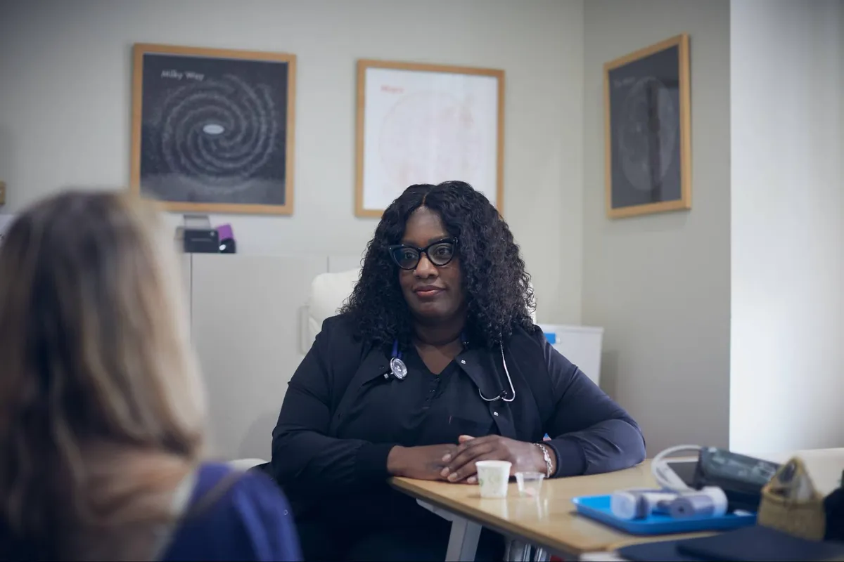A medical provider meeting with a client during an intensive outpatient program